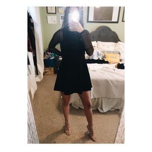 Black BCBGeneration dress with mesh sleeves